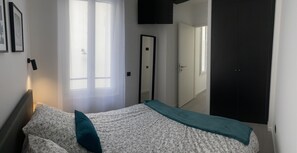 1 bedroom, desk, iron/ironing board, travel cot