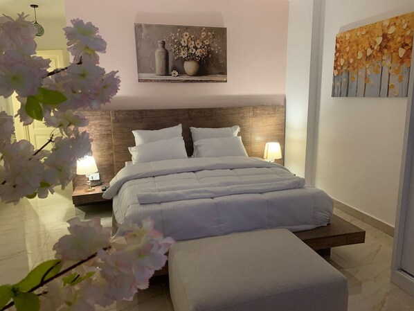 Grand-Apartment, 3 Schlafzimmer, Gartenblick | 3 Schlafzimmer, Minibar, kostenloses WLAN, Bettwäsche