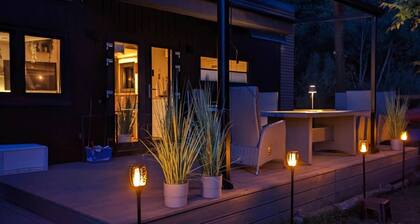 Cozy Tiny House with large terrace directly on the lake. Barbecue and kayaks included