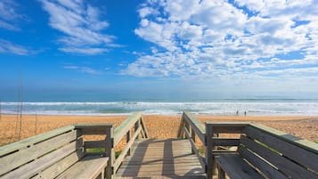 On the beach, sun-loungers, beach towels