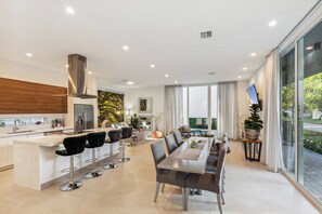 Fridge, coffee/tea maker, cookware/dishes/utensils