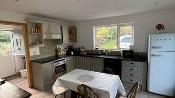 Fridge, microwave, stovetop, cookware/dishes/utensils