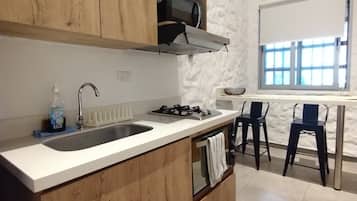 Camera familiare | Cucina privata | Prodotti per la pulizia