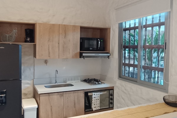 Comfort Triple Room, 1 Bedroom | Private kitchen | Cleaning supplies