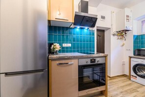Exclusive Apartment | Private kitchen | Full-size fridge, microwave, oven, coffee/tea maker