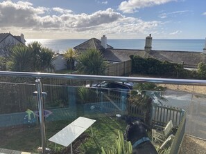 Outdoor dining - Family beach house w/hot tub, easy beachfront access, and sea views! (Downderry)