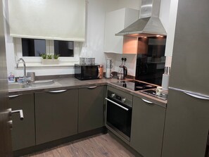 Apartment, 2 Queen Beds | Private kitchen | Fridge, microwave, oven, stovetop