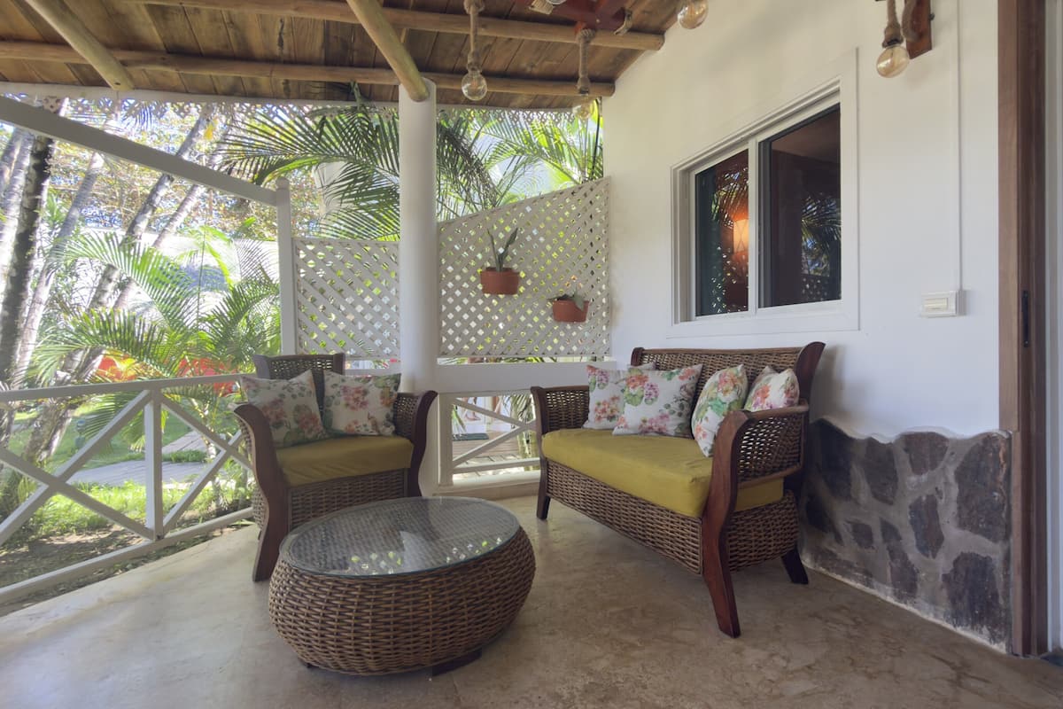 Family Triple Room, Pool View | Terrace/patio
