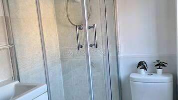 Shower, free toiletries, hair dryer, towels
