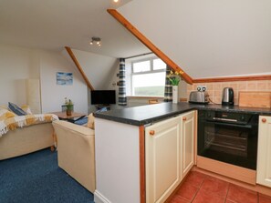 Een koelkast, een vaatwasser, een waterkoker, een broodrooster