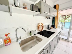 Fridge, microwave, stovetop, coffee/tea maker