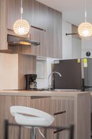 Apartment | Private kitchen | Full-size fridge, microwave, stovetop, dishwasher