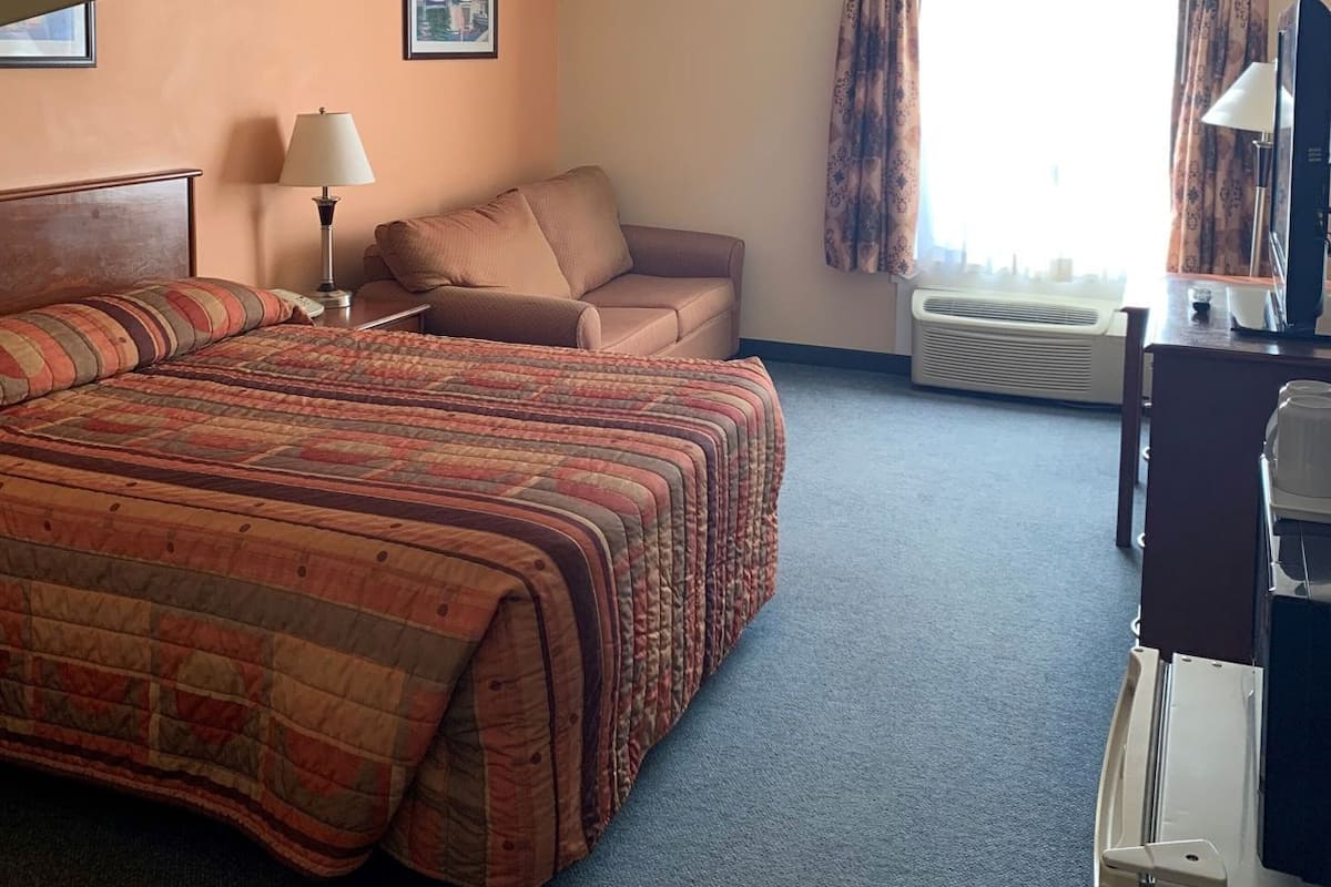 Blackout drapes, iron/ironing board, free WiFi, bed sheets