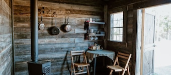 Romantic OFF GRID Micro Cabin for 2 with a cozy wood stove.