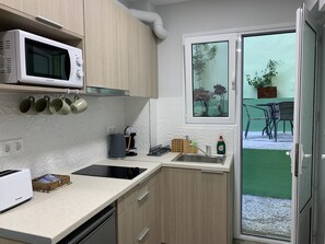 Microwave, coffee/tea maker, toaster, dining tables