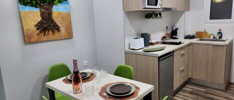 Microwave, coffee/tea maker, toaster, dining tables