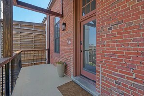 Guests can enjoy a balcony with a view from this residential building.