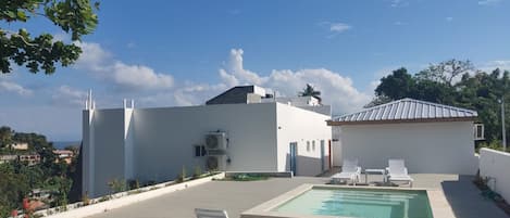 Outdoor pool, pool loungers