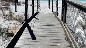 A wooden boardwalk leading to a beach with a clear blue sky. - Luxury Watercolor House: Beach Access & Golf Cart (Santa Rosa Beach)