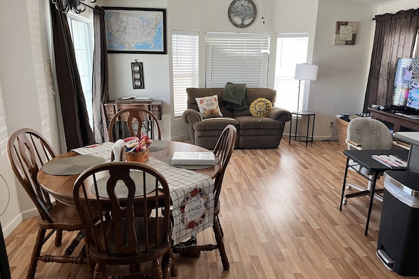 Dining Room and Living Room, with reclining love seat.
