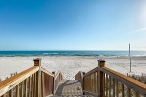 On the beach, sun-loungers