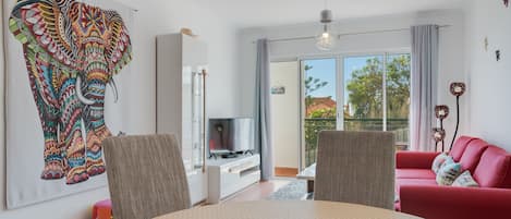 Premier Apartment | Living area | 42-inch flat-screen TV with cable channels, TV