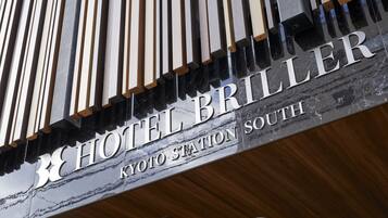 A sign for Hotel Briller at Kyoto Station South.