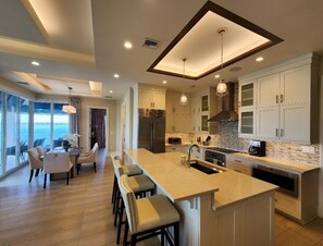 Fridge, microwave, stovetop, dishwasher - Three Bedroom Luxury Condo in Beautiful February Point (George Town)