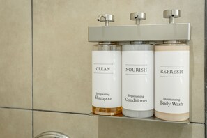 Shower, hair dryer, towels, soap