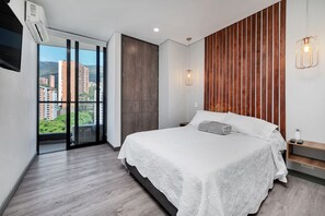 Apartment, 2 Bedrooms (1404) | 2 bedrooms, in-room safe, blackout curtains, iron/ironing board - Apartamentos Class Suites by HOUSY HOST (Medellín)