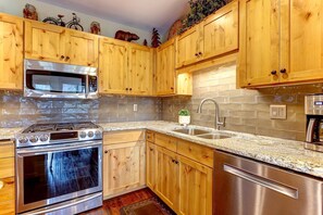 Full-sized fridge, microwave, oven, dishwasher