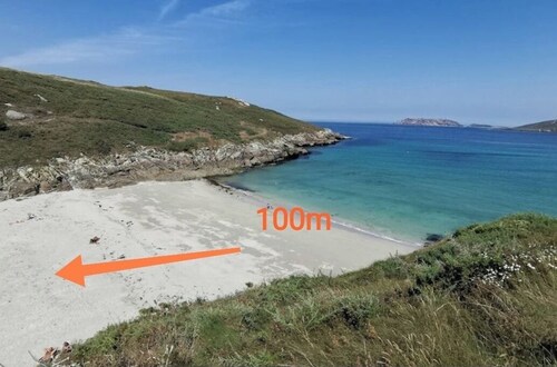 100 m from the beach overlooking the Sisargas archipelago