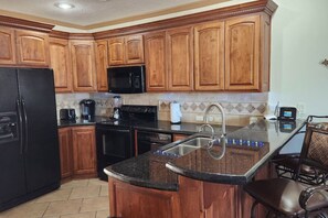 Fridge, microwave, coffee/tea maker, toaster