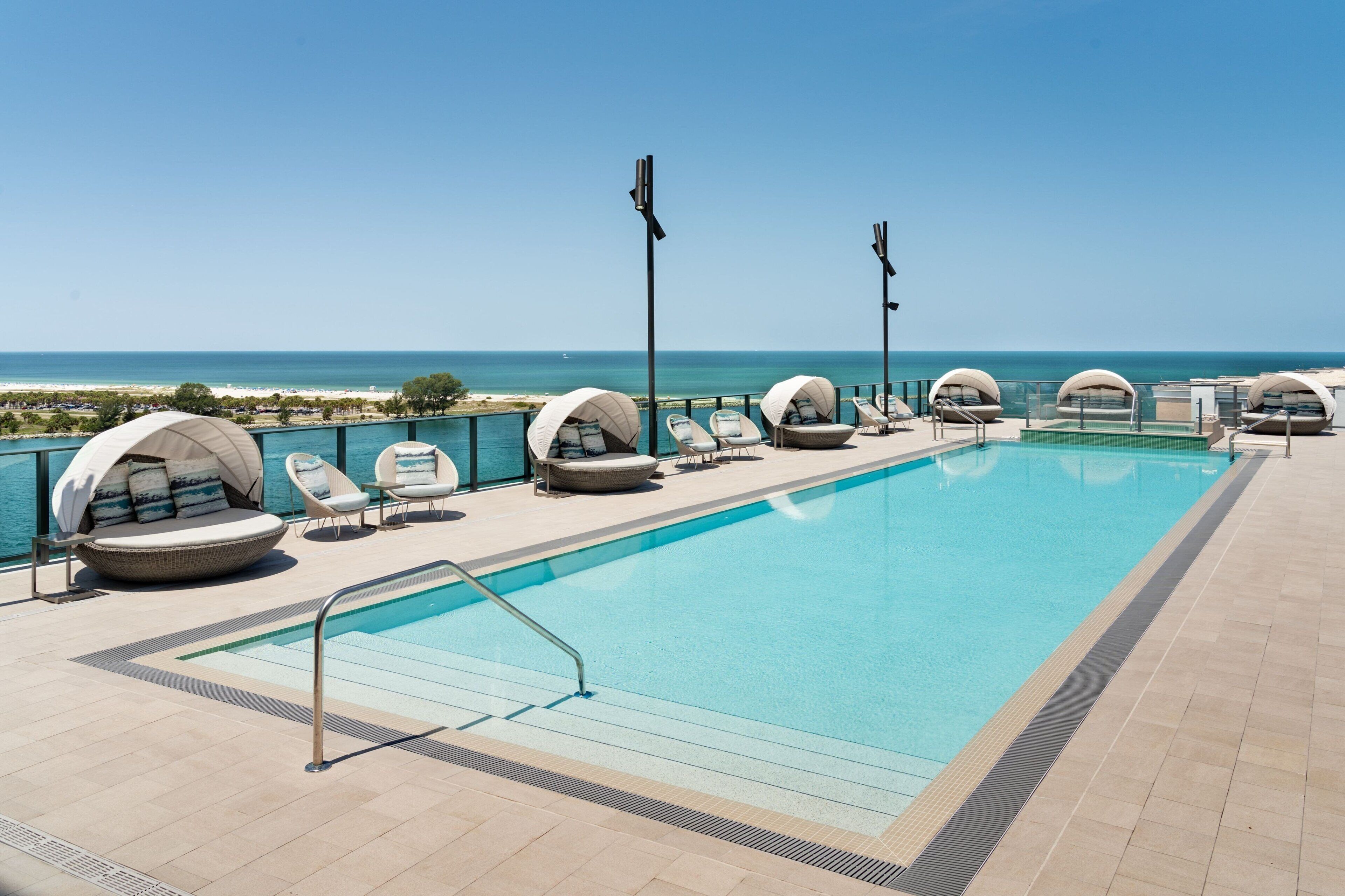 Outdoor pool, pool umbrellas, sun loungers