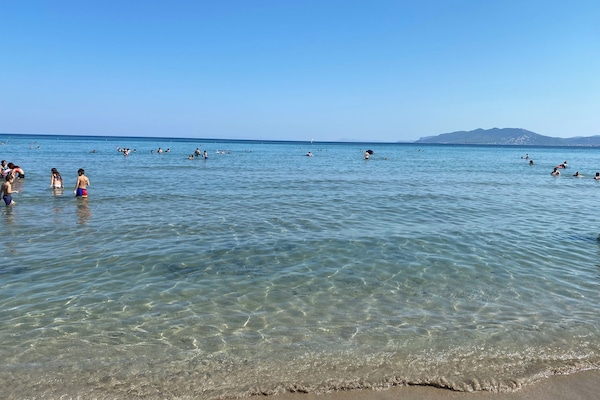 Una playa cerca, toallas de playa