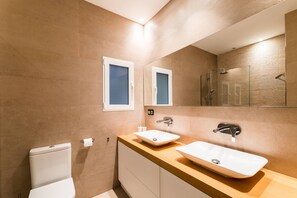 Bathtub, hair dryer, towels