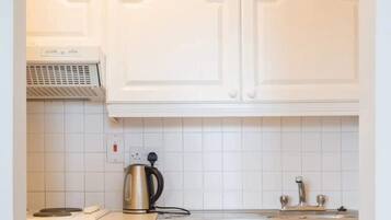 Apartamento básico, várias camas | Parte interna