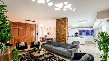 Basic Villa | Living area | 37-inch flat-screen TV with cable channels, TV, table tennis