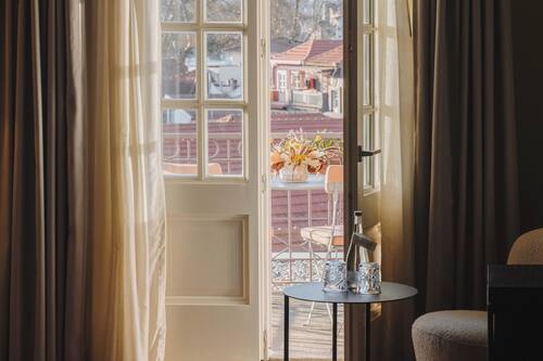Superior Room with Balcony | Minibar, in-room safe, desk, blackout drapes