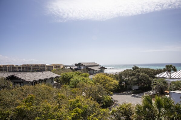 A coastal property with multiple buildings, a beach, and dense greenery. - Lake front, with Gulf View! 10 min walk to beach (Santa Rosa Beach)