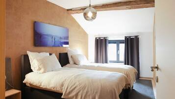 4 chambres, chambres insonorisées, fer et planche à repasser