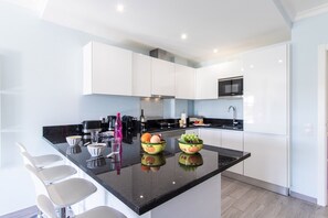 Fridge, microwave, oven, coffee/tea maker