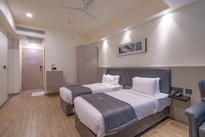 Egyptian cotton sheets, premium bedding, down duvets, memory-foam beds - Republic Inn (Tirupati)