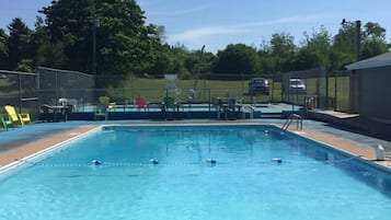 Seasonal outdoor pool, pool umbrellas, pool loungers