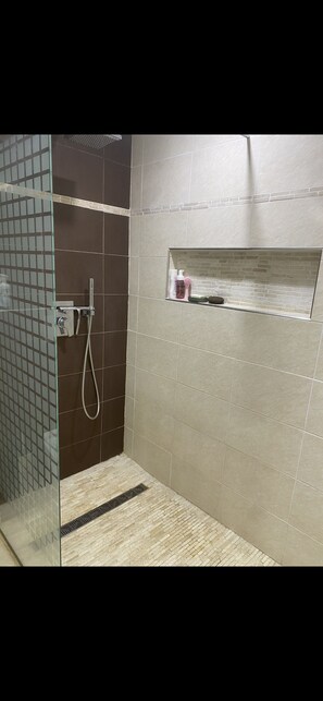 Shower, hair dryer, towels, soap