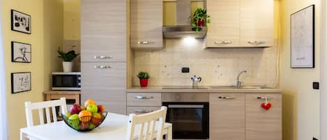 Panoramic Studio | Private kitchen | Full-sized fridge, microwave, oven, stovetop