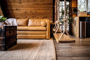 Smart TV, fireplace, foosball, books