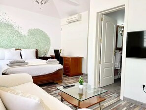 2 dormitorios, tabla de planchar con plancha, cuna de viaje y wifi