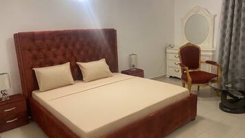 Economy Room | Select Comfort beds, desk, free WiFi, bed sheets