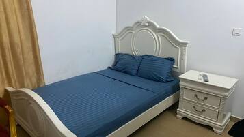 Basic Room | Select Comfort beds, desk, free WiFi, bed sheets